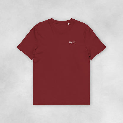 Front view of a burgundy coloured 100% organic cotton t-shirt.