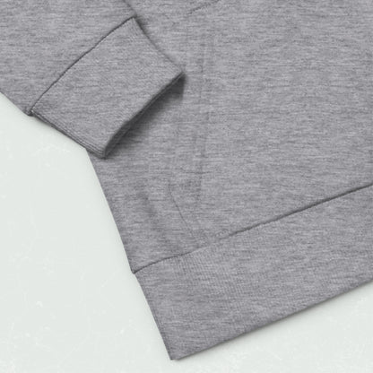 Close-up of grey eco-friendly hoodie sleeve and pocket details showing soft, ribbed cuff and hem.